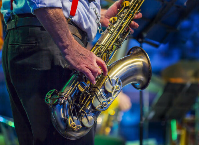 Saxophone player performing on stage