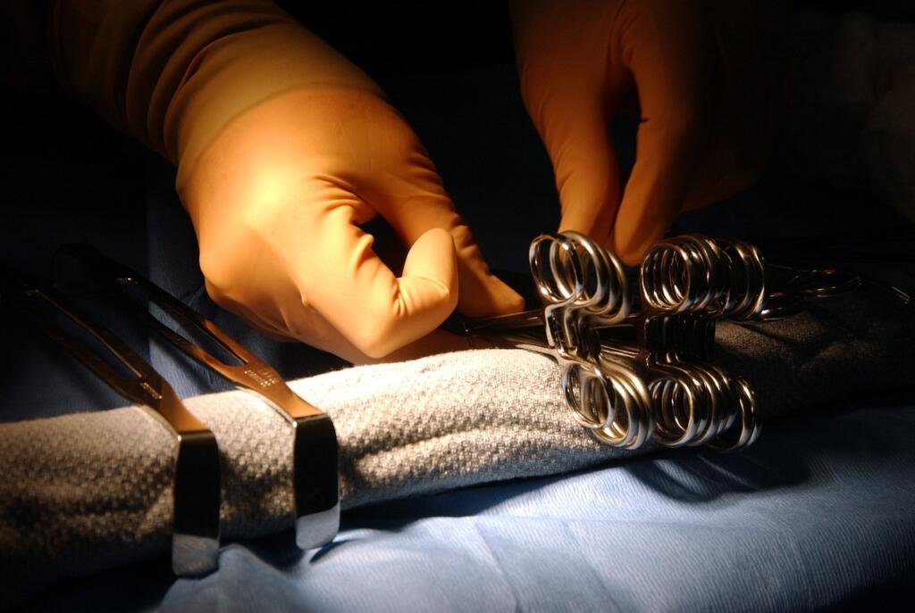 surgical instruments, hands, technician