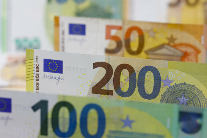 European Union banknotes placed next to each other. Euro banknotes are not made of paper, but of pure cotton fiber to improve their durability. EUR currency.