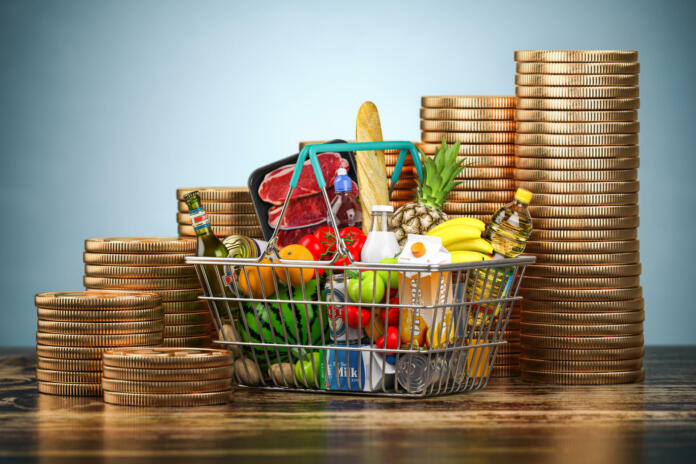 Inflation, growth of food sales or growth of market basket or consumer price index concept. Shopping basket with foods and coin stacks. 3d illustration