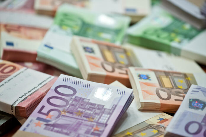 lots of euro bills on the table