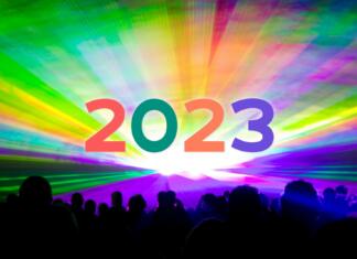 Najbolj pričakovani koncerti leta 2023 v naši bližini! Luxury entertainment with audience silhouettes turn of the year celebration. Premium nightlife event at holidays season party time.