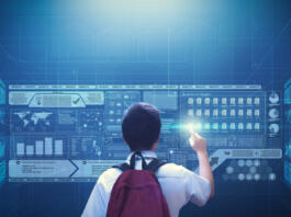 Male school boy student using virtual screen hologram