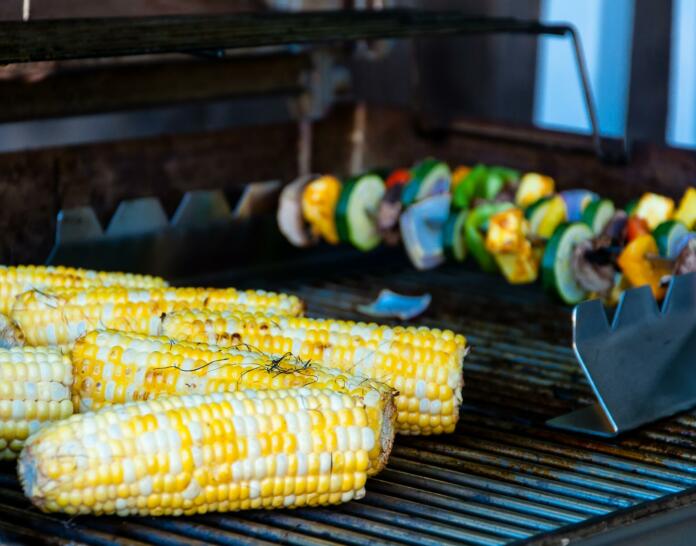 Nothing screams summer better than the colors of yellow corn and veggies on a grill.