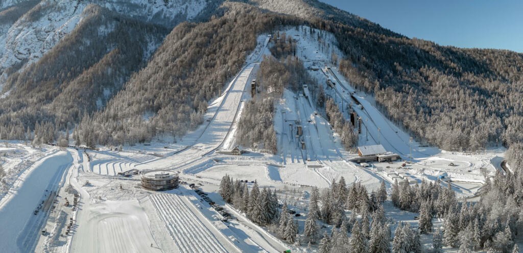 Ski Jump in Planica near Kranjska Gora Slovenia covered in snow at winter time. Aerial Panorama