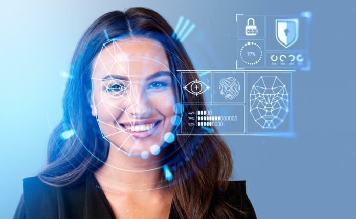 Smiling businesswoman in formal wear watching at digital interface with facial recognition by digital interface with line connection hologram. Concept of modern technology of artificial intelligence