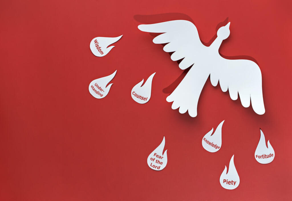 the holy spirit in the form of a white dove carries seven gifts, the flames of the gifts of the holy spirit