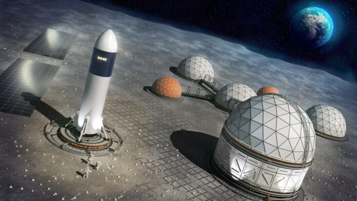 3d concept illustration of a settlement on the surface of the moon. The picture show the settlement with a rocket and the Earth in the background.