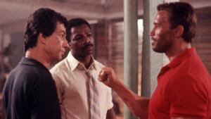 John McTiernan, Carl Weathers in Arnold Schwarzenegger na snemanju filma Predator