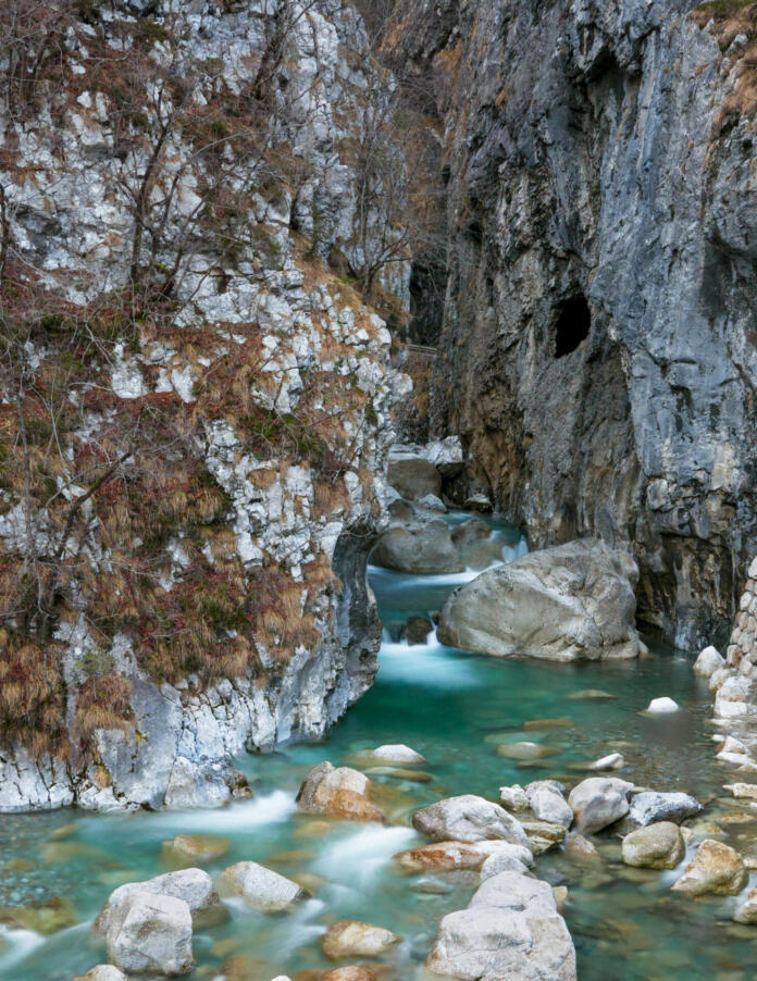 Beautiful gorge with turquoise creek, river, stream, long exposure Dovzanova soteska, Trzic, Slovenia.