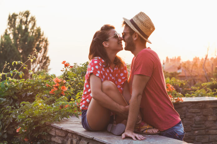 Young,Couple,In,Love,On,The,Balcony