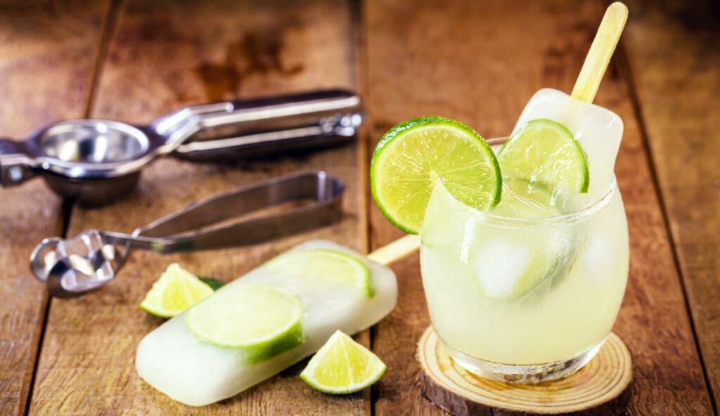 lemon and cachaça popsicle, drink from Brazil called caipirinha served with alcoholic drink ice cream.