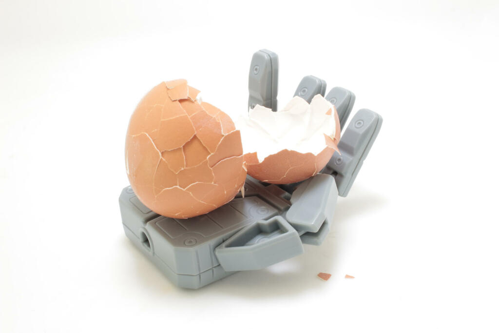 the Robot hand with the egg shell