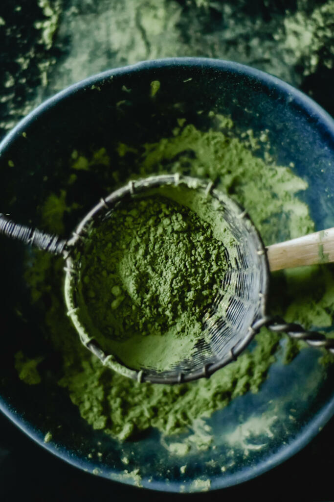 Top view photo of matcha powder on sieve