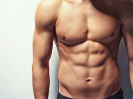 Very muscular and sexy torso of young man with copy space