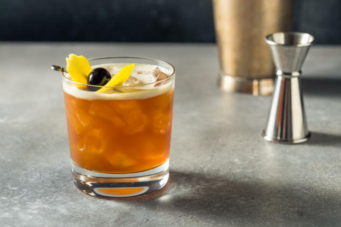 Boozy Refreshing Cold Amaro Sour Cocktail with Lemon