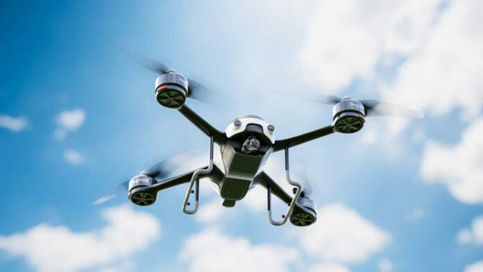 Drone white color flying close-up. taken from below while the sky is clear. 3D Render.