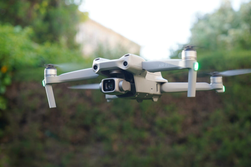 Spain; 05 20 2022 : Dji air 2s flying in the garden with sensors