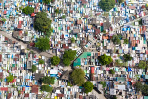 The northern cemetery in Manila with many graves and crypts in the city center aerial view. Travel concept.