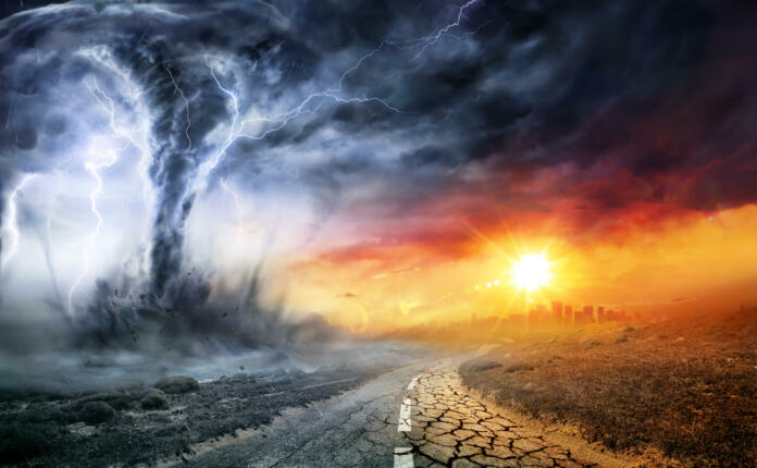 Tornado In Stormy Landscape - Climate Change And Natural Disaster Concept