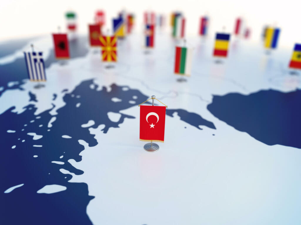 Flag of Turkey in focus among other European countries flags. Europe marked with table flags 3d rendering