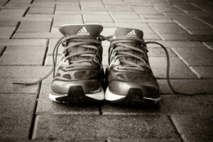 Ipswich, Australia - January 2, 2014: Photo of a pair of Adidas running shoes processed in black and white.