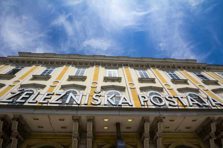 "n"npicture of the building of the Ljubljana Zelezniska Postaja. The Ljubljana railway station  is the principal railway station in Ljubljana, the capital of Slovenia. It was completed on 18 April 1848, a year before the South railway, connecting Vienna and Trieste, reached Ljubljana.