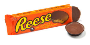 "Toronto, Canada - May 10, 2012: This is a studio shot of Reese's Peanut Butter Cups candy made by Reese, a subsidiary of The Hershey Company, isolated on a white background."