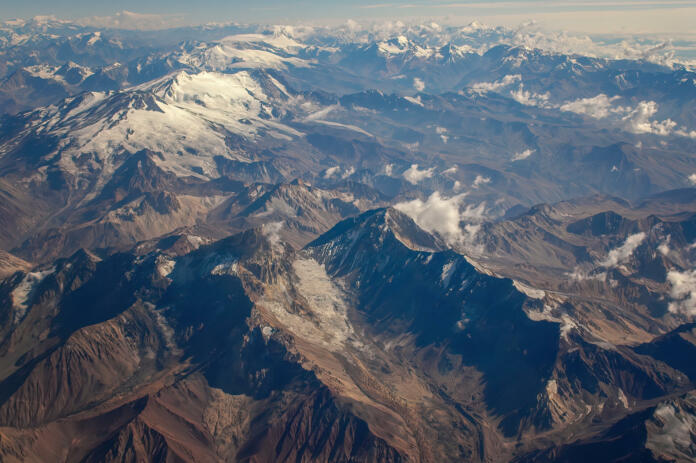 Andes Mountains (Cordillera de los Andes) viewed from an airplane window, near Santiago, Chile.