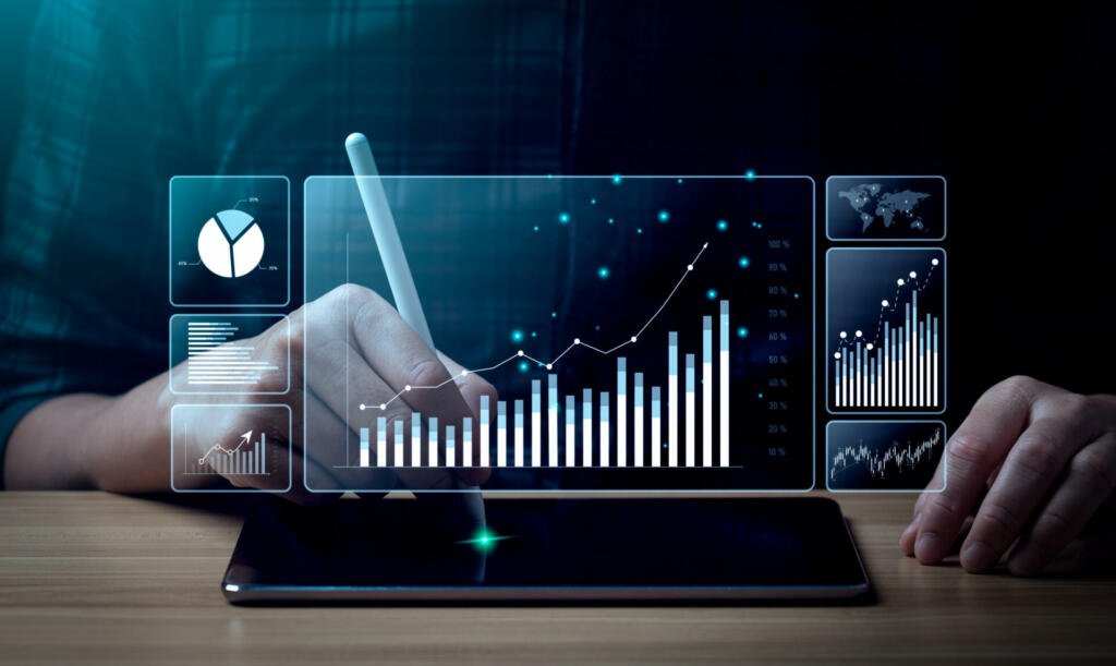 Businessman analyzing business enterprise data management, Business analytics with charts, metrics and KPIs to performance organization. Corporate strategy for finance, operations, sales, marketing