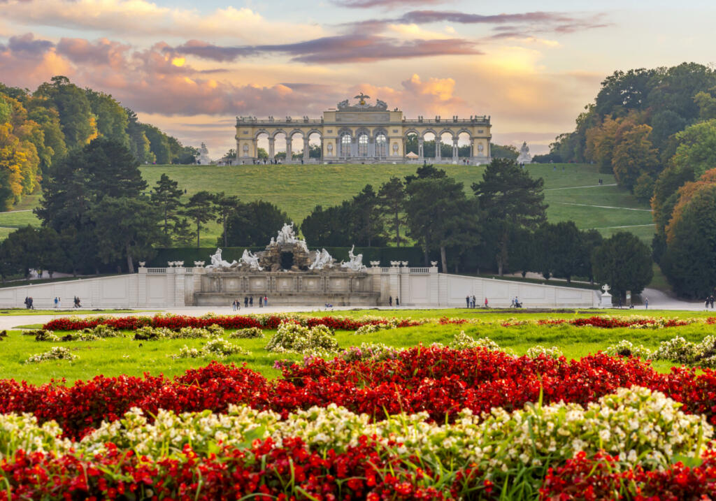 Gloriette pavilion and Neptune fountain in Schonbrunn park, Vienna, Austria