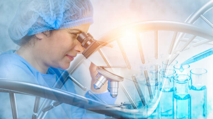 research-and-developement-concept-background-of-dna-strand-overlay-with-blurred-female-scientist-using-microscope-in-biotechnology-laboratory-concept-of-gene-and-chromosome-research-stockpack-istock research and developement concept background of DNA strand overlay with blurred female scientist using microscope in biotechnology laboratory. concept of gene and chromosome research