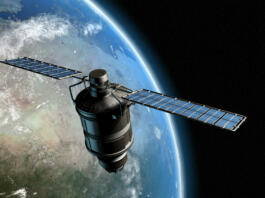Satellite orbiting earth, photo-realistic high-res 3D rendering