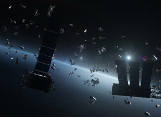 Raziskave vesolja ne obetajo, zdaj grozijo še rakotvorne snovi 3D render of waste from broken artificial satellites floating in orbit in space around planet Earth