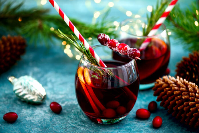 Christmas punch on a winter table, front view, festive warming alcohol concept