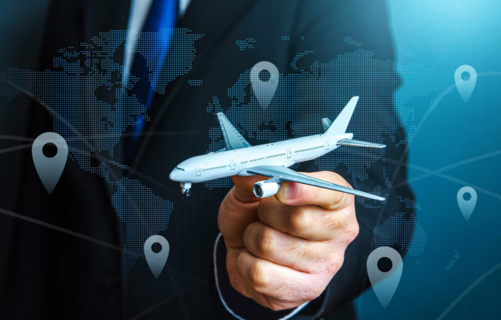 Civil aviation and commercial airlines. Travel and business trips. Transport system and infrastructure. Air communication. Flights traffic. Routes and directions. Businessman or official with a plane.