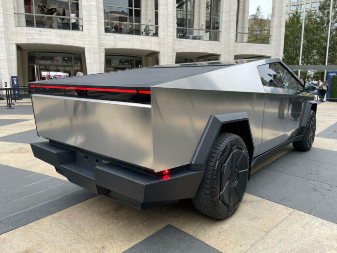 Cybertruck by Tesla is put out in public at Lincoln Center in New York along with other Tesla vehicles.