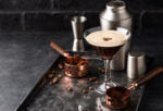 Espresso Martini cocktails with coffee beans and shaker