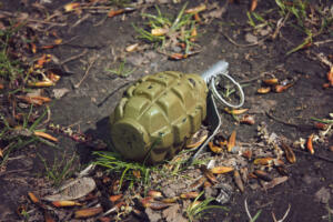 hand grenade grenade lying on the ground.