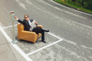 scene of businessmen, parks his armchair and pay the parking
