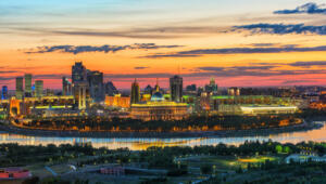 View of the central part of Astana city with the residence of the President of Kazakhstan under the expressive summer sky