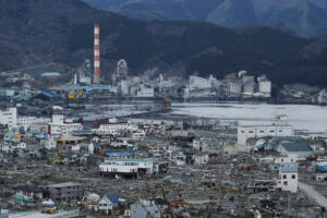 A View of debris and mud covered at Tsunami hit Destroyed Industrial Area in Ofunato on March 23, 2011, Japan. On 11 March 2011, an earthquake hit Japan with a magnitude of 9.0, the biggest in the nation's recorded history and one of the five most powerful recorded ever around the world. Within an hour of the earthquake, towns which lined the shore were flattened by a massive tsunami, caused by the energy released by the earthquake. With waves of up to four or five metres high, they crashed through civilians homes, towns and fields.