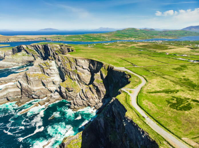 Amazing wave lashed Kerry Cliffs, widely accepted as the most spectacular cliffs in County Kerry, Ireland. Tourist attractions on famous Ring of Kerry route.