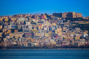 Distant view of buildings of Naples waterfront, Italy