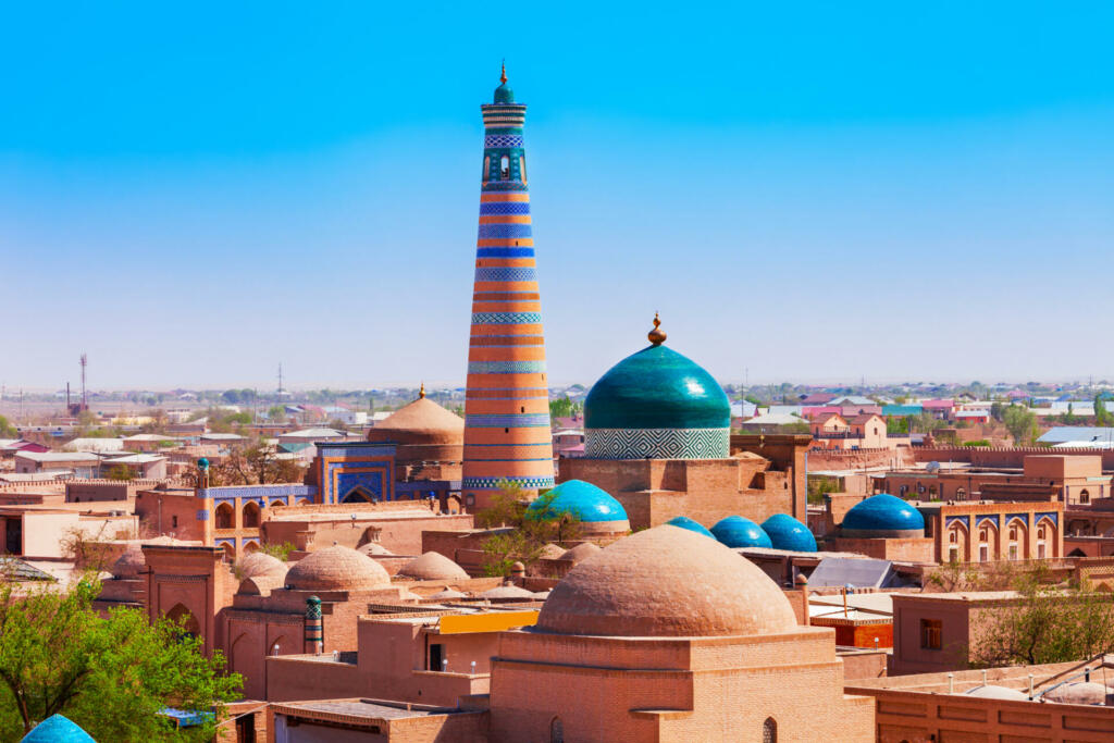 Islam Khodja Minaret and Pakhlavan Makhmoud Mausoleum at the Itchan Kala, the walled inner town of the city of Khiva in Uzbekistan