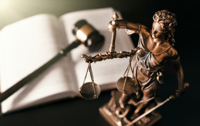 Lady justice. Statue of Justice in library. Legal and law background concept