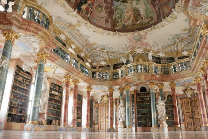 Wiblingen, Germany – July 09, 2022: A Rococo and Baroque decorations of the library in Wiblingen Abbey, near Ulm city, by architects Christian and Johann Wiedemann, 18th century.