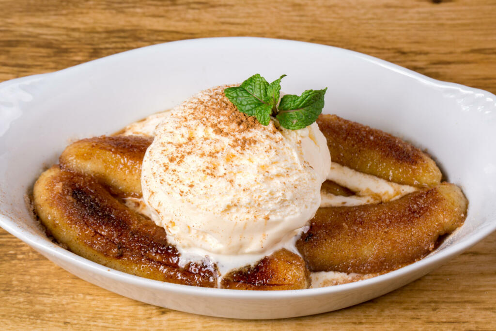 Banana Flambe With Vanilla Ice Cream. close up.