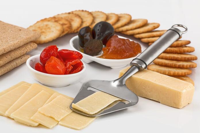 cheese slicer, crackers, appetizers