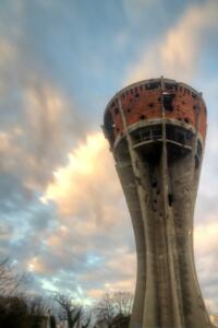 Damaged water tower in Vukovar. Time is passing , brave tower stay on ground.